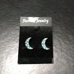 Silver tone blue moon earrings